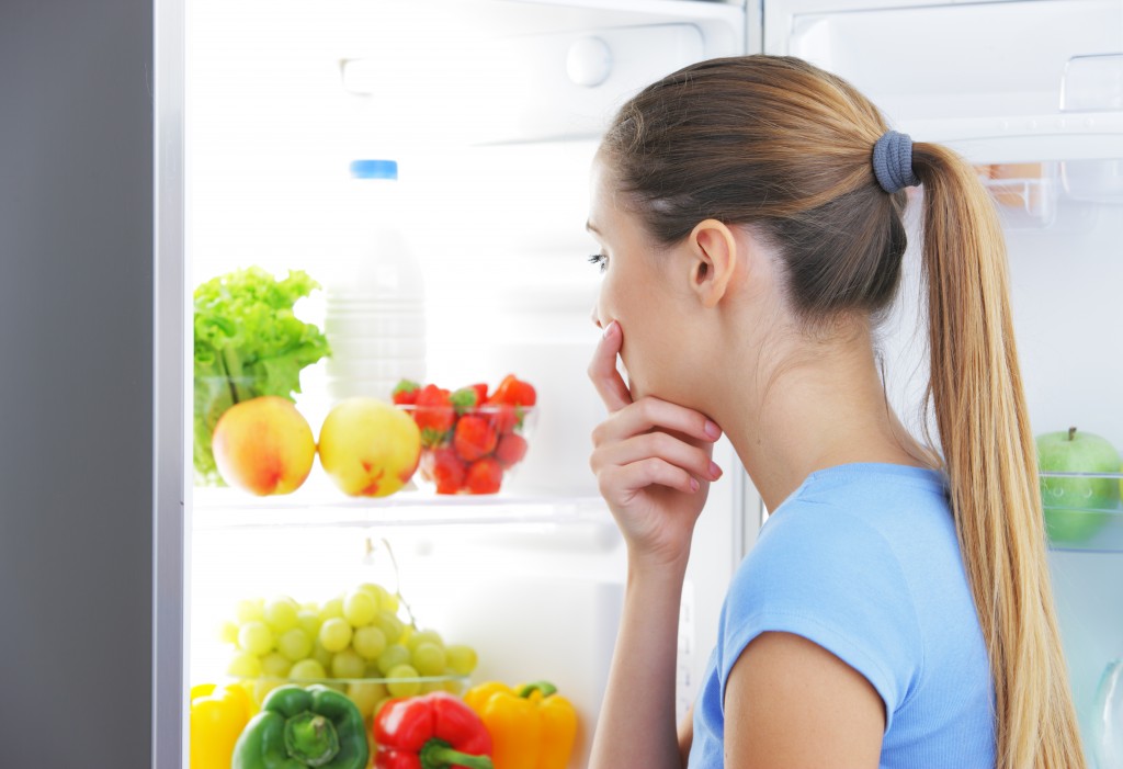 Young woman choosing food